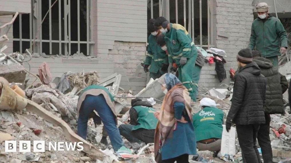 Tehran mother's daughter trapped in rubble as strikes escalate