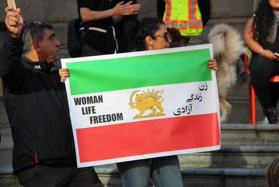 Iran war protester speaks to Al Jazeera from top of Washington bridge