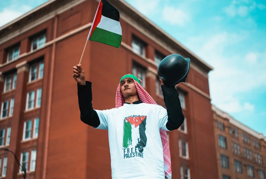 Lamine Yamal waves Palestine flag during Barcelona's La Liga win parade