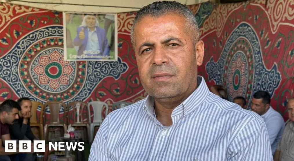West Bank settler clash forces father to dig up body