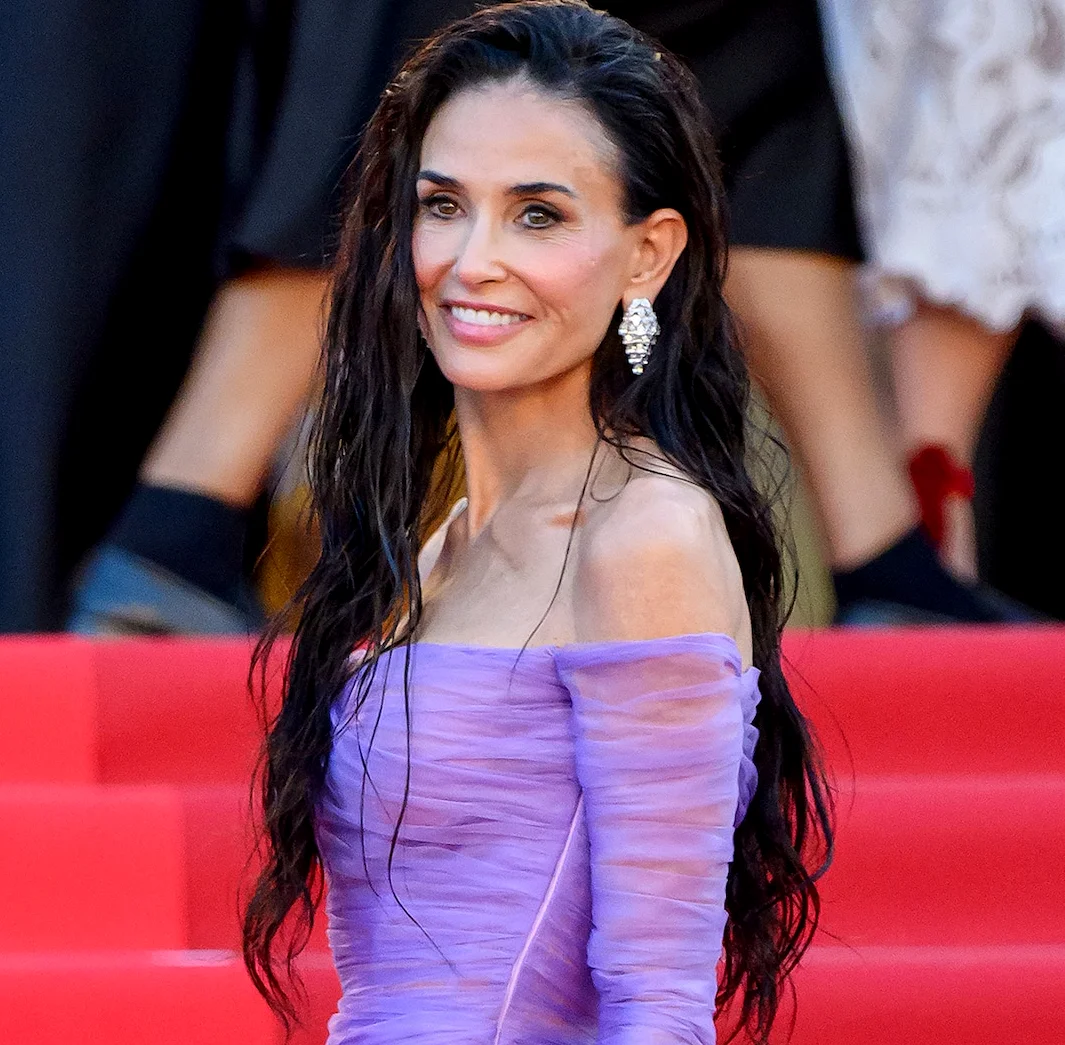 Demi Moore Steals Spotlight at Cannes 2026 with Purple Gucci Gown