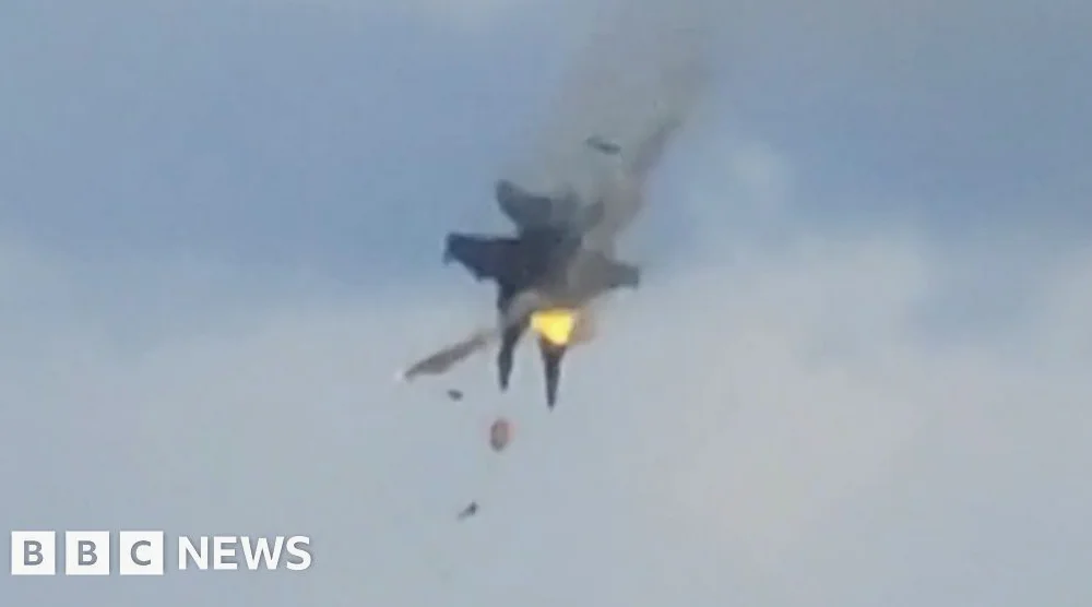 Moment two fighter jets collide mid-air at US air show