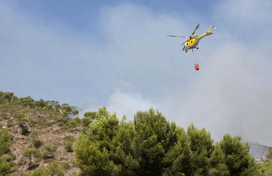 Firefighters battle wildfires in Spain’s eastern Castellon province