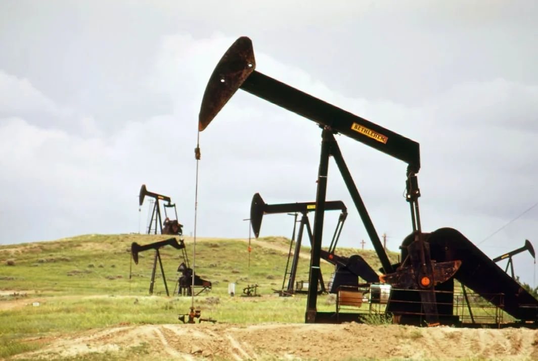 Petrol prices strain US households as oil giants Chevron, Exxon profits soar