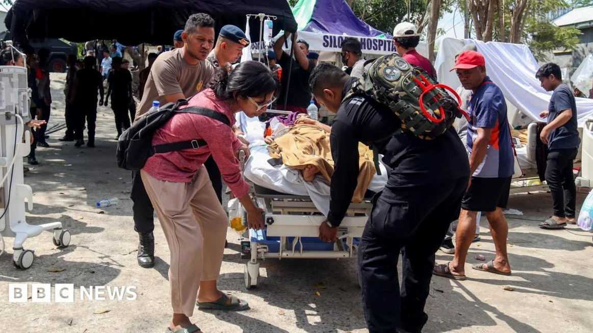 Indonesia Earthquake: Rescuers Search for Survivors After 7.7 Magnitude Quake