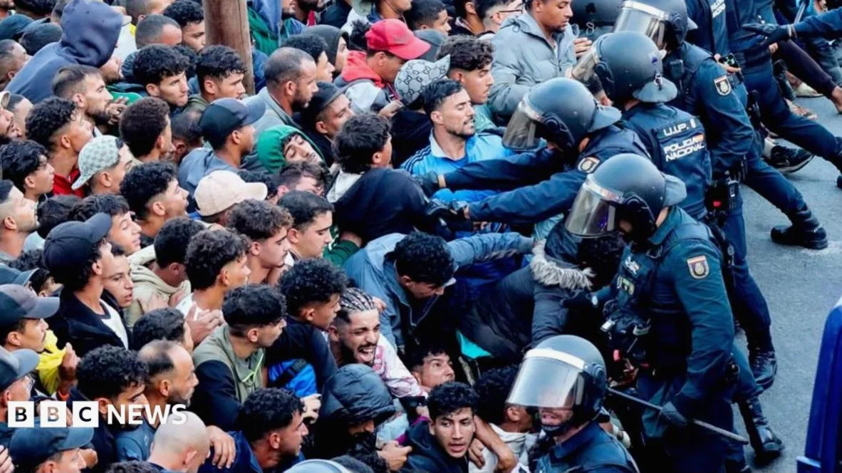 Police begin operation to move migrants from Ceuta beaches