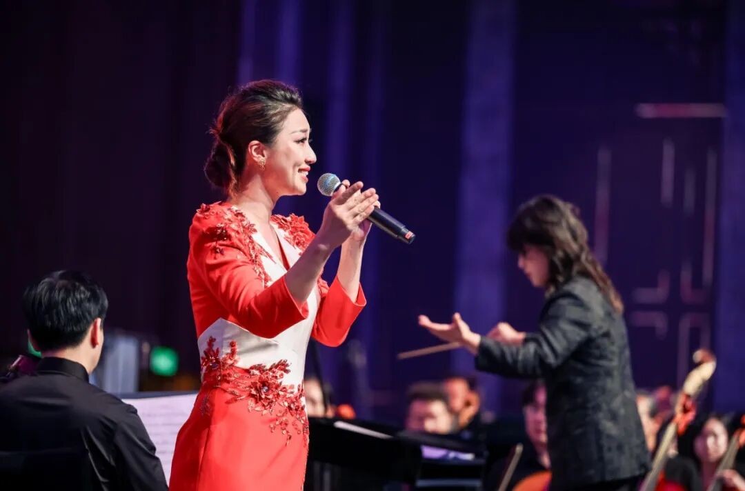 A singer performs with the orchestra.